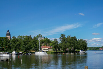 Fototapeta premium Scenic view of lake against blue sky