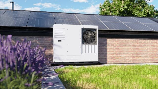 A heat pump with photovoltaic panels installed on the roof of a single-family house, along with a green ro, forms an eco-friendly heating and air conditioning solution for the property