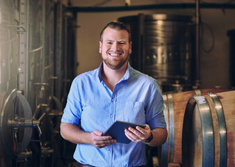 Portrait, man and happy with tablet in brewery as manager with pride on product, process and...