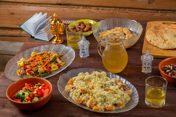 A festively laid table with traditional food for the holiday of Urba Bayram