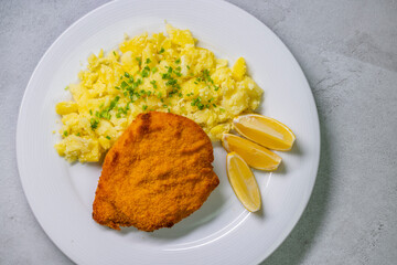 Chicken cutlet with couscous and lemon