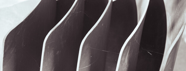 Strange background. Backs of plastic chairs with cobwebs
