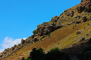 Mountains, grass, blue sky, valley and scattered clouds, nature in Sulaymaniyah , iraq
