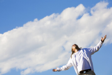 Man Worshipping Outdoors