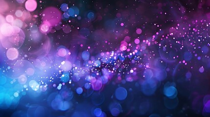 Abstract blue and purple glitter sparkles on black background.