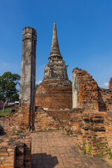 Fototapeta premium Historic ruins of Wat Maha That temple in Ayutthaya, Thailand.