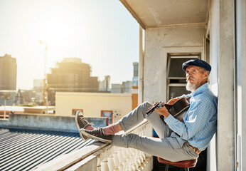 Artist, senior and man with acoustic guitar for playing with retired musician on balcony in town...