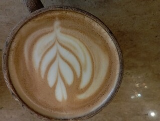 Set of paper take away cups of different coffee latte or cappuccino isolated on white background, top view