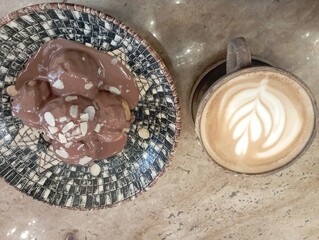 restaurant menu, cafe menu, chocolate profiteroles and latte coffee isolated on wood