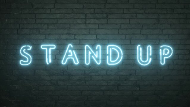 Stand Up neon sign on black brick wall background