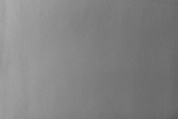 Texture of genuine leather, artificial leatherette grey background