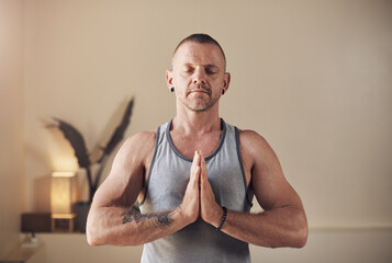 Yoga, man and namaste for exercise, meditation and spiritual awareness or reiki balance. Male...