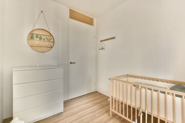 Modern nursery room with natural elements and simple furniture
