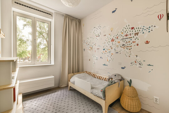 Cozy and charming children room with a world map decor