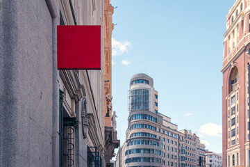 Blank billboard on a sunny Madrid street