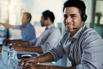 Telemarketing, smile and portrait of man with headset, coworking space and consulting at help desk....