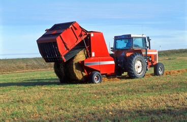 Tractor Making Bales