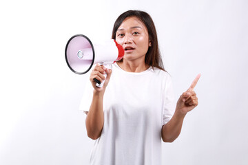 Strict woman of Asian ethnicity 20s wear white shirt hold megaphone announces warning, discounts...