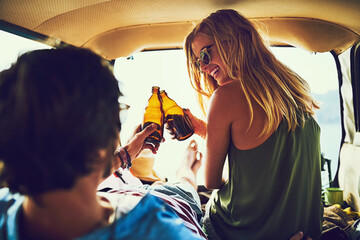 Travel, couple and car for cheers and beer, boot and happy in vehicle for road trip and vacation. Smile, sunset or date for man and female person in transport, together or trunk for adventure or calm - Powered by Adobe