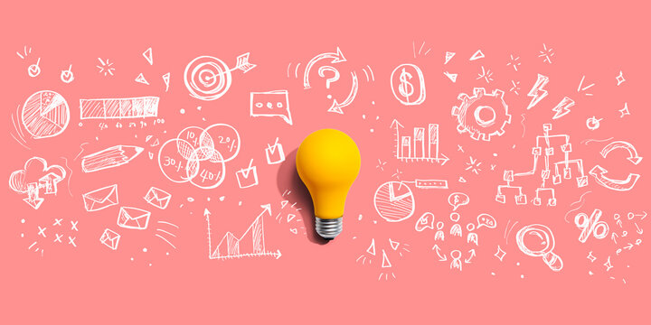 Marketing strategy concept with a light bulb - Flat lay