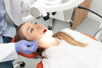 Dental treatment. Woman on dental examination