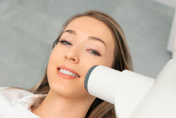 Dentist takes an x-ray picture of the tooth.