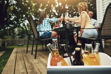 Weekend, outside and case with alcohol for friends with beer, cider and spirits on porch or...