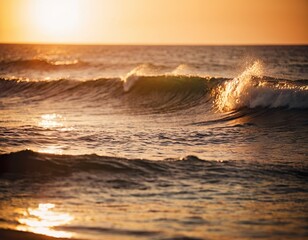 Sunset and waves in ocean. Warmy water texture with bokeh.
