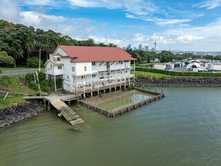 Fototapeta premium Abandoned boathouse and outdor pool in Bayswater, Auckland, New Zealand.