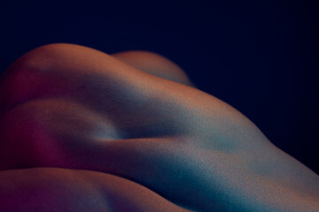 Man, back and muscle in studio, bare and skin texture for cosmetics or strong on black background....