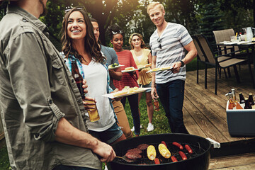 Friends, barbecue and help for dishing with plate in backyard with diversity, cooking or meat on...