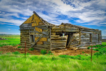 Vintage log house on the Montana Landscape
