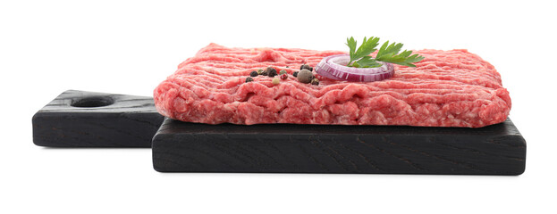 Board with raw ground meat, onion, peppercorns and parsley isolated on white
