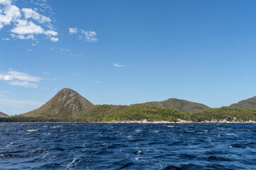 sailing on a yacht in the australian in the remote forest wilderness in spring in australia