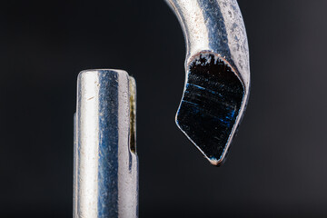 Close-up of the carbine. Background with selective focus and copy space