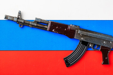 Automatic rifle on the flag of the Russian Federation or Russia. Symbolic background or backdrop