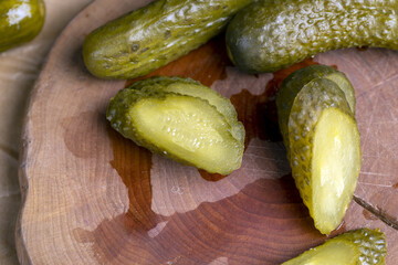 green cucumbers pickled in vinegar