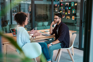 Workshop, office and people planning for graphic design, research and online project collaboration together. Internet, man and woman with creative ideas, technology and partnership discussion at desk