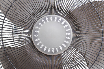 Close up Dirty dust in the fan impacts the air, allergies to health. Dirty dust on the fan on white...