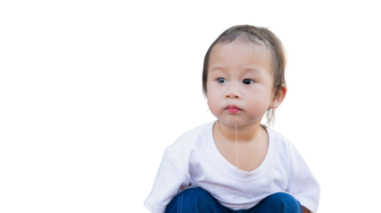 Portrait of child sitting and playing, he is drooling because his teeth are about to come in, Boy has tears in his eyes, toddler with adorable expression and bright eyes. On isolated background.