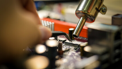 
electronic technician,banner, hands repairing electronic devices The use of modern one-stop service center concepts.