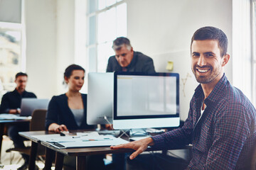 Man, portrait and happy in office with computer for research and development for company with technology. Business people, conversation and collaboration for problem solving and email proposal.