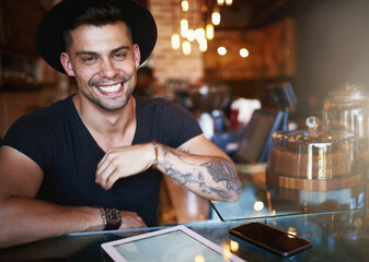 Portrait, coffee shop and man in cafe with tablet for small business, stock inventory and store website. Restaurant, hospitality and owner by counter on digital tech for orders, online and internet