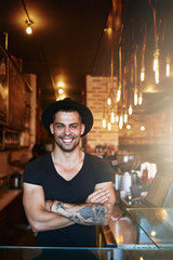 Smile, portrait and businessman with arms crossed at cafe for friendly, welcome or customer service pride. Happy, face and restaurant manager in hotel kitchen for barista sales, trust or management