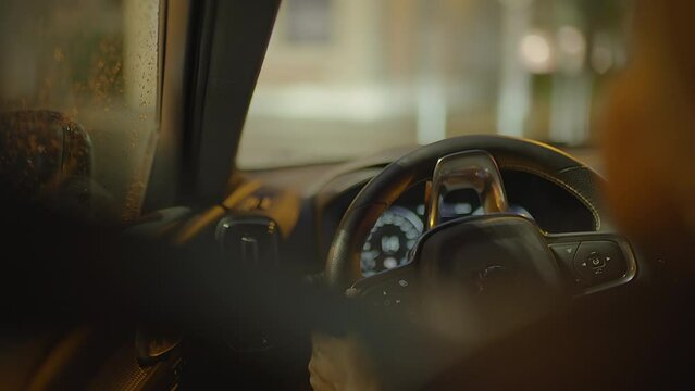 Young African Woman Driving Car On Urban City Street Commuting
