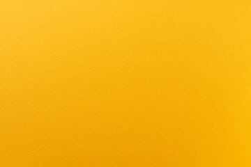 表面がざらざらした黄色の紙のアップ