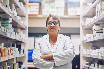 Mature, woman and portrait of pharmacist in shop with inventory of drugs, pills or medicine....