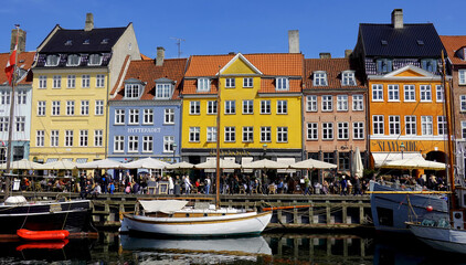 COPENHAGEN, DENMARK, APRIL 27, 2024: Copenhagen iconic view. The popular Nyhavn port area with the...