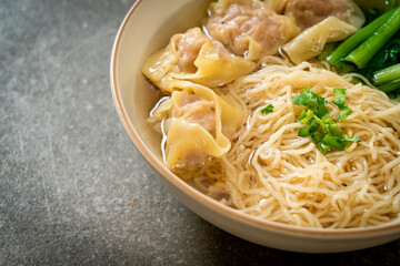 egg noodles with pork wonton soup or pork dumplings soup and vegetable