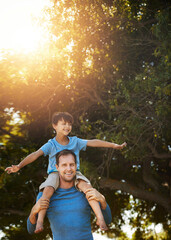 Portrait, father and piggyback kid at park for love, care or family bonding together in nature....